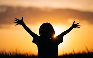Silhouette_Of_Little_Boy_-_Child_Kid_With_Open_Hands_In_Beautiful_Nature__Sunset_original_2470738 (1)
