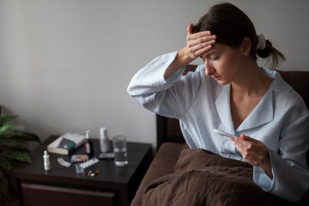 https___www.magnific.com_free-photo_medium-shot-sick-woman-with-fever_22114213.htm#fromView=search&page=1&position=22&uuid=83b16419-e209-4f69-b2f1-ad497fda35c5&track=a.jpg